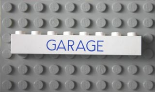 Brick 1 x 8 with Blue 'GARAGE' Sans-Serif Thin Pattern