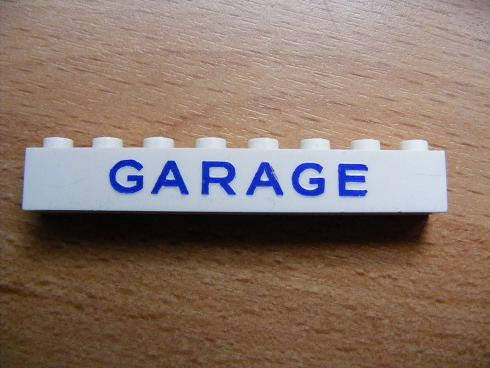 Brick 1 x 8 with Blue 'GARAGE' Sans-Serif Pattern