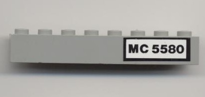 Brick 1 x 8 with Black 'MC 5580' Pattern (Sticker) - Set 5580