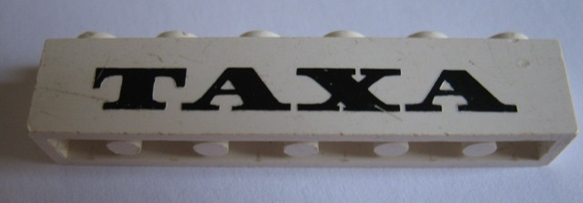 Brick 1 x 6 with Black 'TAXA' Pattern