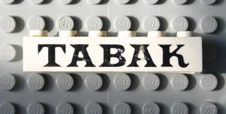 Brick 1 x 6 with Black 'TABAK' Serif Pattern