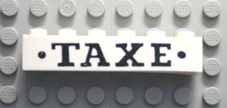 Brick 1 x 6 with Black 'TAXE' and Dots Bold Pattern