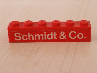 Brick 1 x 6 with White 'Schmidt & Co.' Text on Red Background Pattern (Sticker) - Set 1601