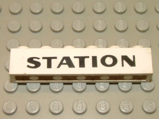 Brick 1 x 6 with Black 'STATION' Text Pattern