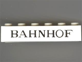 Brick 1 x 6 with Black 'BAHNHOF' Thin Pattern