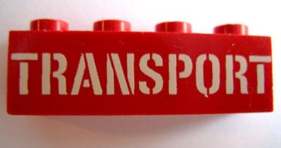 Brick 1 x 4 with White 'TRANSPORT' Stencil Pattern