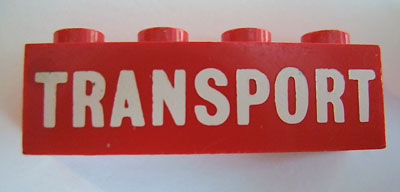 Brick 1 x 4 with White 'TRANSPORT' Solid Pattern