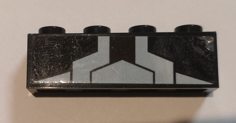 Brick 1 x 4 with White Triangle and Stripes Pattern (Sticker) - Set 76103