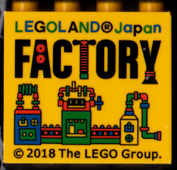 Brick 2 x 4 x 3 with LEGOLAND Japan, Black 'FACTORY', and Blue, Green, and Red Machine Pattern