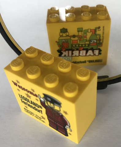 Brick 2 x 4 x 3 with Welcome LEGOLAND Feriendorf and Legoland Deutschland Resort Fabrik 2020 Pattern on Both Sides