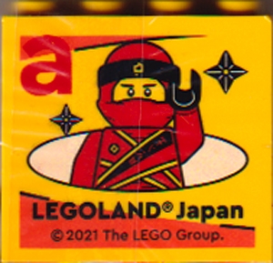 Brick 2 x 4 x 3 with LEGOLAND Japan, Ninjago Kai Minifigure, and Red Lowercase Letter a Pattern