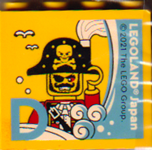 Brick 2 x 4 x 3 with LEGOLAND Japan, Pirate Captain Minifigure (Black Beard), and Medium Blue Capital Letter D Pattern