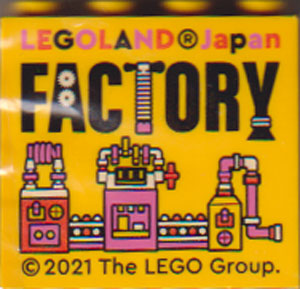 Brick 2 x 4 x 3 with LEGOLAND Japan, 'FACTORY', and Orange, Dark Pink, and White Machine Pattern