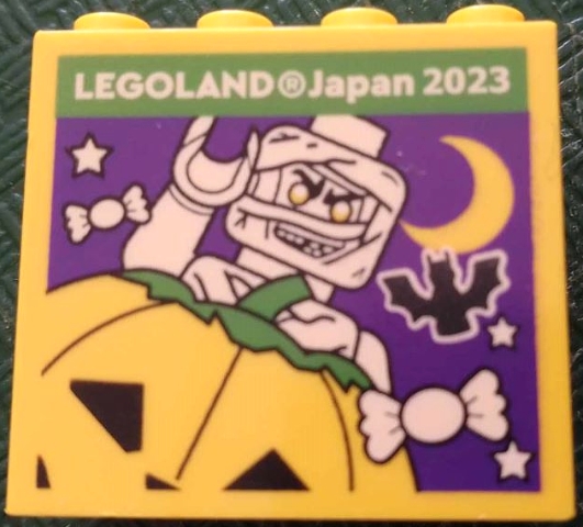 Brick 2 x 4 x 3 with LEGOLAND Japan 2023, Mummy Minifigure, Pumpkin Jack O' Lantern, Crescent Moon, Stars, Bat and Candies Pattern