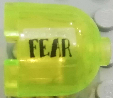 Brick, Round 2 x 2 x 1 2/3 Dome Top with Black 'FEAR' Pattern Model Left Side (Sticker) - Set 7786