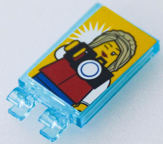 Tile, Modified 2 x 3 with 2 Open O Clips With Female Minifigure Holding Camera Pattern (Sticker) - Set 40346