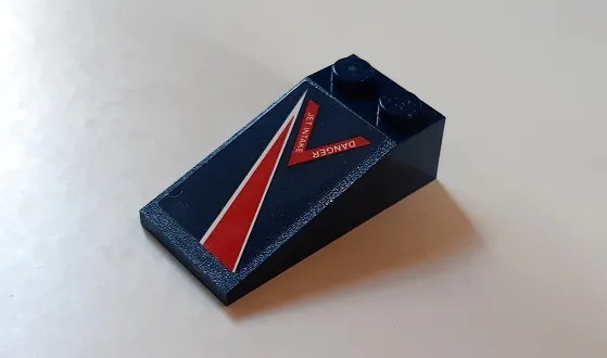 Slope 18 4 x 2 with Red Lightning and 'Danger Jet Intake' Pattern Model Left Side (Sticker) - Set 60177