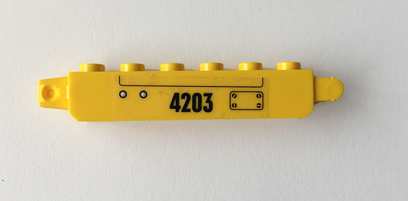 Hinge Brick 1 x 6 Locking with Panel, Black '4203', and Rivets Pattern Model Left Side (Sticker) - Set 4203