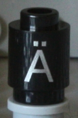 Brick, Round 1 x 1 with Silver Capital Letter A with Diaeresis (Ä) Pattern on Both Sides