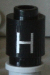 Brick, Round 1 x 1 with Silver Capital Letter H Pattern on Both Sides