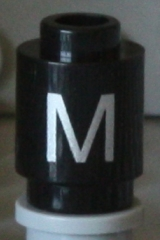 Brick, Round 1 x 1 with Silver Capital Letter M Pattern on Both Sides