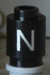 Brick, Round 1 x 1 with Silver Capital Letter N Pattern on Both Sides