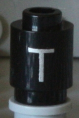 Brick, Round 1 x 1 with Silver Capital Letter T Pattern on Both Sides