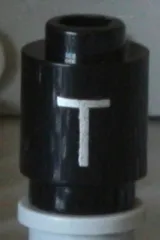 Brick, Round 1 x 1 with Silver Capital Letter T Pattern on Both Sides