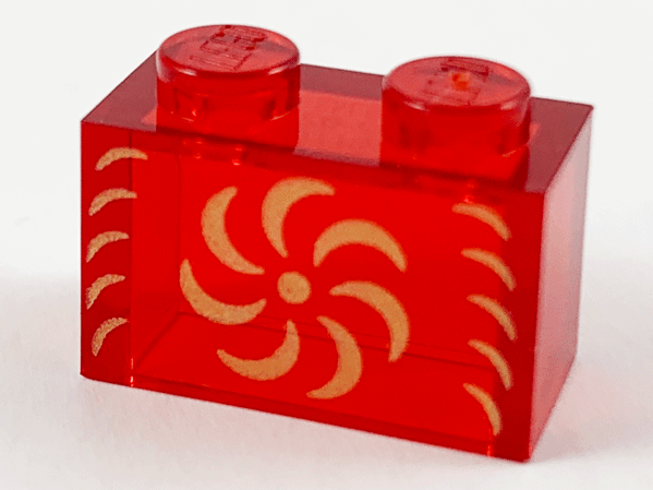 Brick 1 x 2 without Bottom Tube with Gold Pinwheel Pattern