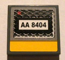 Tile 2 x 2 with Black 'AA 8404' on Grille and Yellow Line Pattern (Sticker) - Set 8404