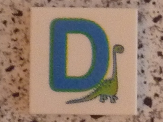 Tile 2 x 2 with Letter D Blue with Dinosaur Pattern