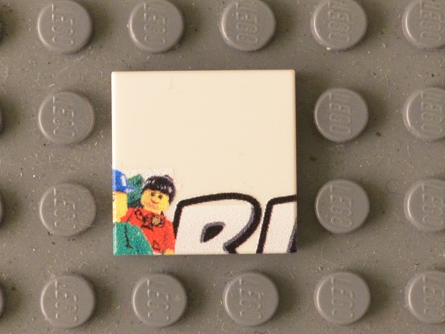 Tile 2 x 2 with Minifigures and Black 'RL' Upper Half Pattern