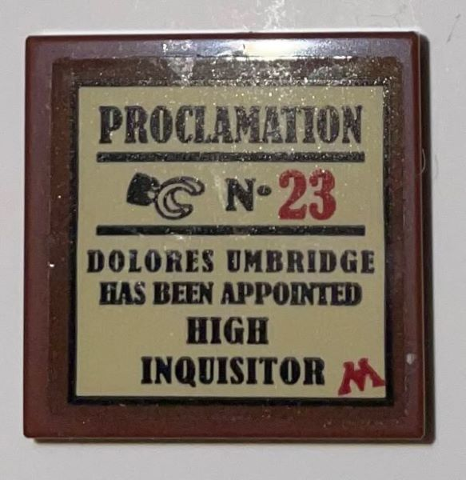 Tile 2 x 2 with Black and Red 'PROCLAMATION No. 23', Minifigure Hand, Text, and Letter M on Tan Background Pattern (Sticker) - Set 75966