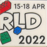 Tile 2 x 2 with LEGO World Logo Right Half, '15-18 APR', 'RLD' and '2022' Pattern