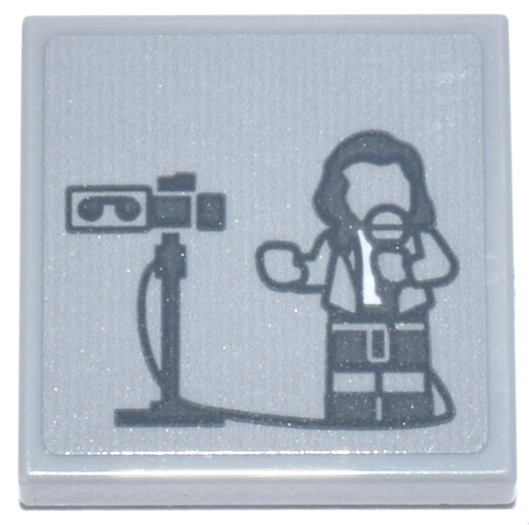 Tile 2 x 2 with Dark Bluish Gray News Reporter Minifigure with Microphone, Camera and White Shirt Pattern (Sticker) - Set 76271