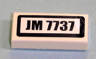 Tile 1 x 2 with 'JM 7737' Pattern (Sticker) - Set 7737