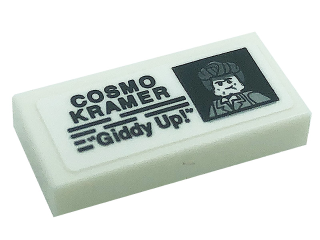 Tile 1 x 2 with Minifigure Photo, 'COSMO KRAMER', and '"Giddy Up!"' Pattern (Sticker) - Set 21328