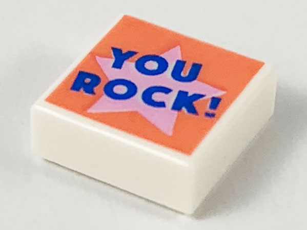 Tile 1 x 1 with Blue 'YOU ROCK!' on Bright Pink Star on Coral Background Pattern