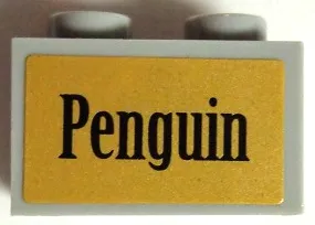 Technic, Brick 1 x 2 with Axle Hole with Black 'Penguin' on Gold Background Pattern (Sticker) - Set 7785