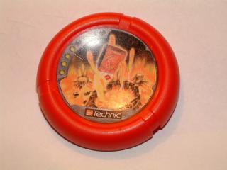 Throwing Disk with Throwbot Torch / Slizer Fire 4 Pips, LEGO Technic Logo, and Flying Box over Volcanoes Pattern