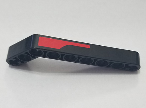 Technic, Liftarm, Modified Bent Thick 1 x 9 (7 - 3) with Red Stripe Pattern Model Left Side (Sticker) - Set 8167