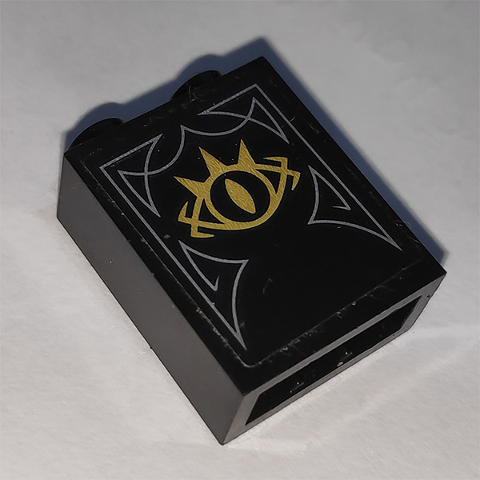 Brick 1 x 2 x 2 with Inside Stud Holder with Gold Goblin King Eye Pattern (Sticker) - Set 41185