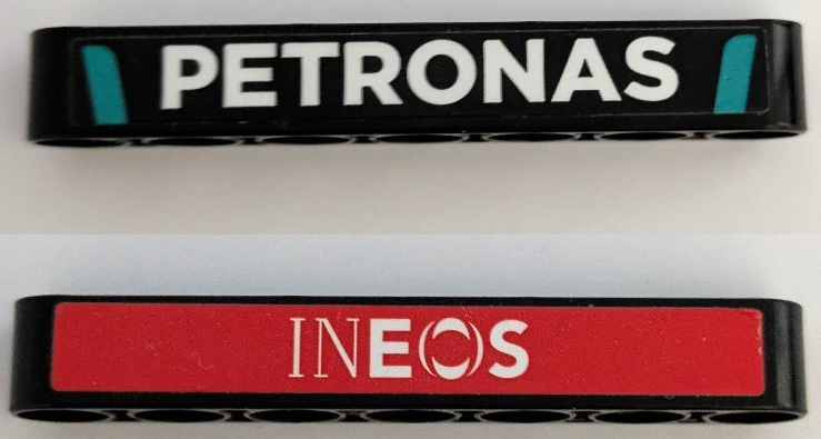 Technic, Liftarm Thick 1 x 7 with White 'INEOS' Logo on Red Background, 'PETRONAS' and Dark Turquoise Stripes Pattern on Both Sides (Stickers) - Set 42165