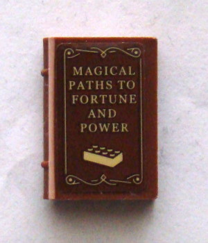 Minifigure, Utensil Book 2 x 3 with 'MAGICAL PATHS TO FORTUNE AND POWER' and 2 x 4 Brick Pattern (Sticker) - Set 75827