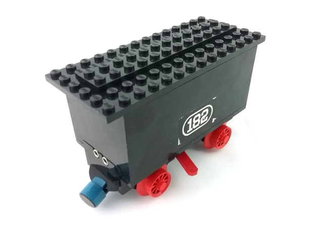Train Battery Box Car with Two Contact Holes, Red Switch Lever, Blue and Red Magnets, Red Wheels, and Black Roof with '182' Pattern on Both Sides (Stickers) - Set 182