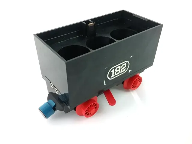 Train Battery Box Car with Two Contact Holes, Red Switch Lever, Blue and Red Magnets, and Red Wheels with '182' Pattern on Both Sides (Stickers) - Set 182