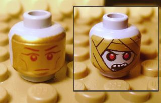 Minifigure, Head Dual Sided Alien with Gold Death Mask / Mummy Wrap with Red Eyes and Open Mouth Pattern