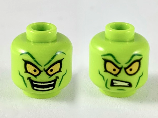 Minifigure, Head Dual Sided Alien Dark Green Eyebrows and Cheek Lines, Large Yellow Eyes, Smile / Confused Pattern