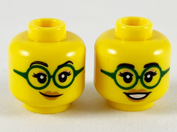Minifigure, Head Dual Sided Female Black Eyebrows, Eyelashes, Nougat Eye Shadow, Dark Green Glasses, Medium Nougat Lips, Lopsided Grin / Open Mouth Smile with Teeth Pattern