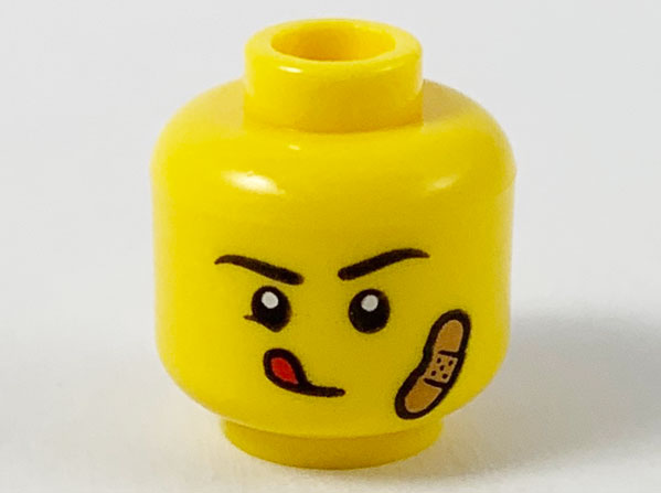 Minifigure, Head Black Eyebrows, Red Tongue Sticking Out, Medium Nougat Bandage on Left Cheek Pattern